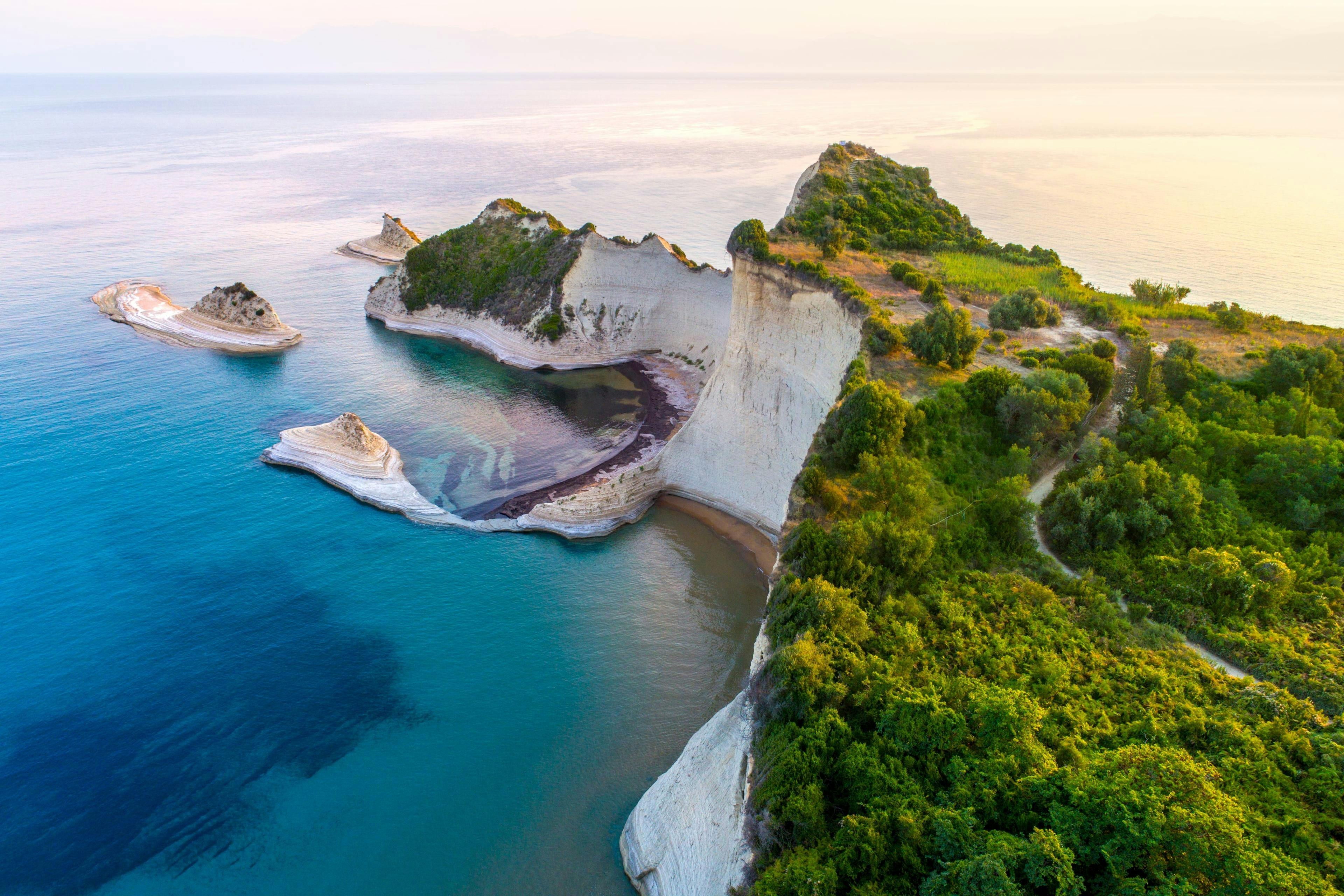 An image of beautiful Cape Drastis, one of the places one might visit on a boat trip in Corfu.