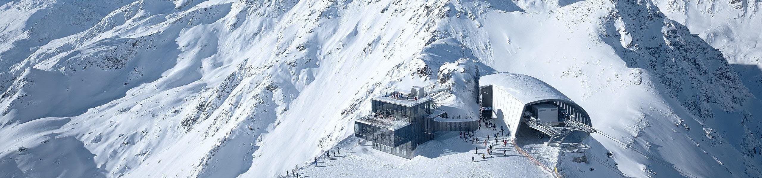 ski-school-soelden_SEM-Resort-Hero_(c)Sölden-Tourismus A bird's-eye view of the Gaislachkogl mountain gondola in the ski resort of Sölden, where local ski schools offer a broad range of ski lessons.